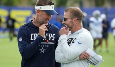 Aug 11, 2026; Woodland Hills, CA, USA; Dallas Cowboys head coach Brian Schottenheimer (left) and Los Angeles Rams head coach Sean McVay react during a joint practice at the Rams Practice Facility.
