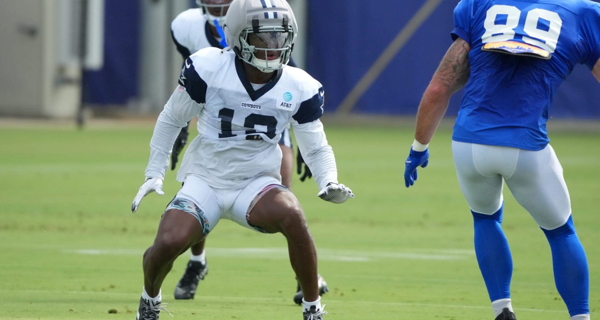 Aug 11, 2026; Woodland Hills, CA, USA; Dallas Cowboys safety Caleb Downs (13) defends against Los Angeles Rams tight end Tyler Higbee (89) during a joint practice at the Rams Practice Facility.