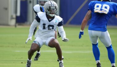 Aug 11, 2026; Woodland Hills, CA, USA; Dallas Cowboys safety Caleb Downs (13) defends against Los Angeles Rams tight end Tyler Higbee (89) during a joint practice at the Rams Practice Facility.