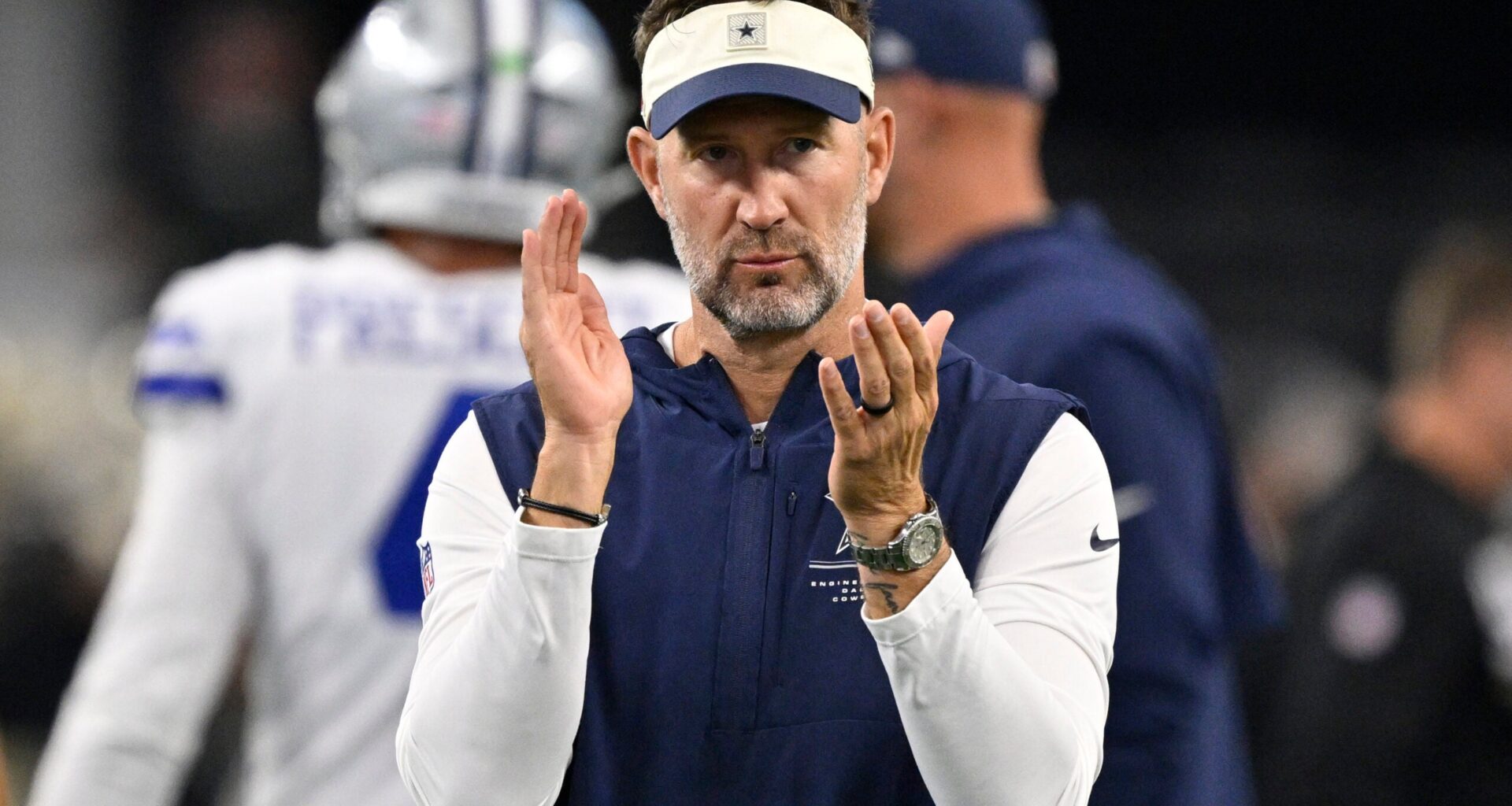 Aug 28, 2026; Arlington, Texas, USA; Dallas Cowboys head coach Brian Schottenheimer looks on during warm ups before the game against the New Orleans Saints at AT&T Stadium.