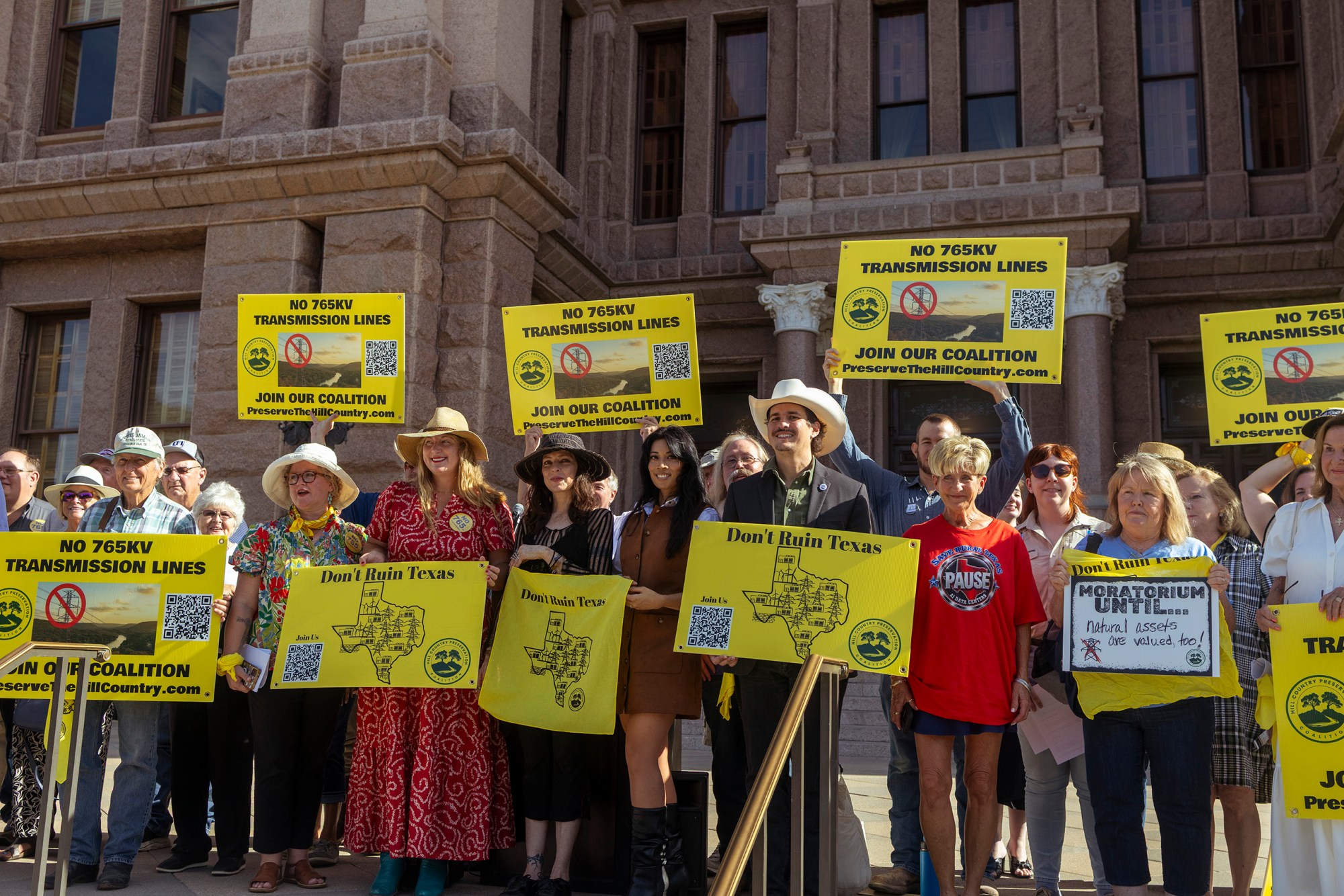 Texans rally on the Capitol steps before a House State Affairs committee hearing on data centers and 765-kV transmission lines on Wednesday, Aug. 19th, 2026.