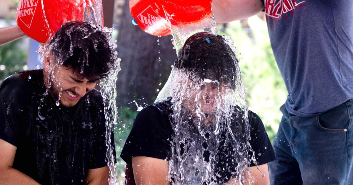 Mavericks look for ways to stay cool on campus in triple-digit heat | Campus