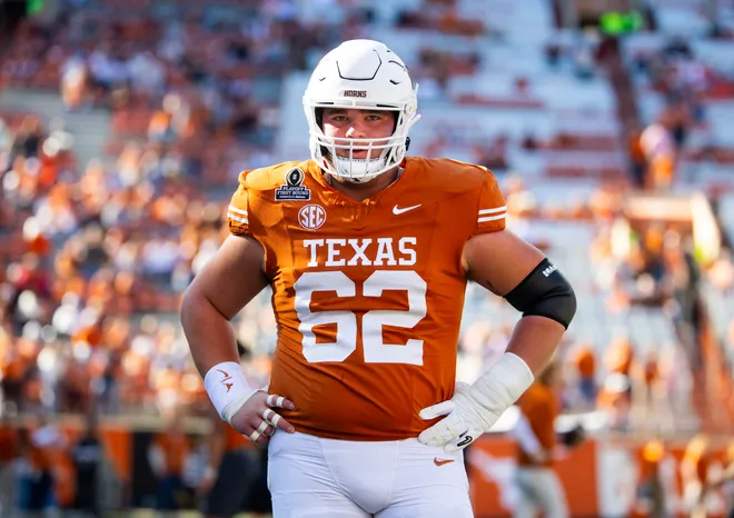 Dec 21, 2024; Austin, Texas, USA; Texas Longhorns offensive lineman Connor Robertson (62) against the Clemson Tigers during the CFP National playoff first round at Darrell K Royal-Texas Memorial Stadium. Mandatory Credit: Mark J. Rebilas-Imagn Images
