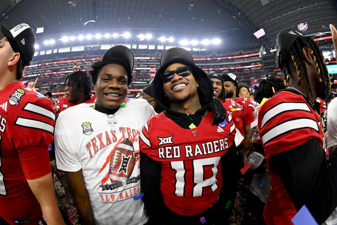 Dec 6, 2025; Arlington, TX, USA; Texas Tech Red Raiders wide receiver Tristian Gentry (left) celebrates with wide receiver Roy Alexander (right) after the win against the BYU Cougars at AT & T Stadium. Mandatory Credit: Jerome Miron-Imagn Images
