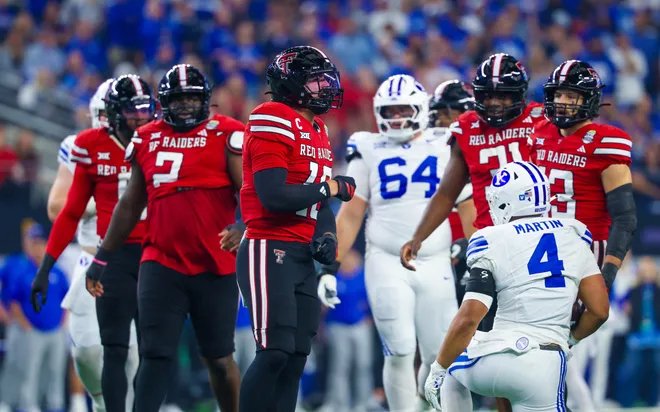 Dec 6, 2025; Arlington, TX, USA; Texas Tech Red Raiders linebacker Jacob Rodriguez (10) reacts in front of BYU Cougars running back LJ Martin (4) during the first quarter at AT & T Stadium. Mandatory Credit: Kevin Jairaj-Imagn Images