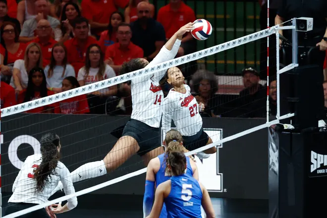 Aug 27, 2026; Arlington, TX, USA; Nebraska Cornhuskers middle blocker Manaia Ogbechie (14) attacks the ball against the Florida Gators during their volleyball match at AT & T Stadium. Mandatory Credit: Chris Jones-Imagn Images