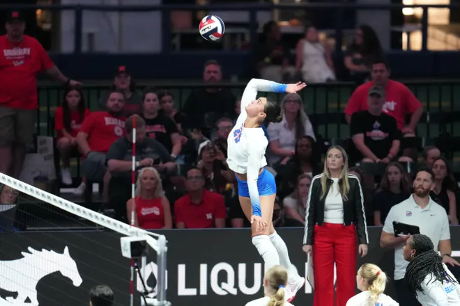 Aug 27, 2026; Arlington, TX, USA; SMU Mustangs outside hitter Suli Davis (25) attacks the ball during their volleyball match against the Nebraska Cornhuskers at AT & T Stadium. Mandatory Credit: Chris Jones-Imagn Images