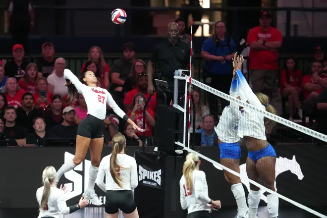 Aug 27, 2026; Arlington, TX, USA; Nebraska Cornhuskers outside hitter Harper Murray (27) attacks the ball against the SMU Mustangs during their volleyball match at AT & T Stadium. Mandatory Credit: Chris Jones-Imagn Images
