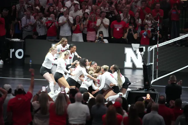 Aug 27, 2026; Arlington, TX, USA; Nebraska Cornhuskers players celebrate after defeating the SMU Mustangs to win the Spikes Under the Lights championship at AT & T Stadium. Mandatory Credit: Chris Jones-Imagn Images