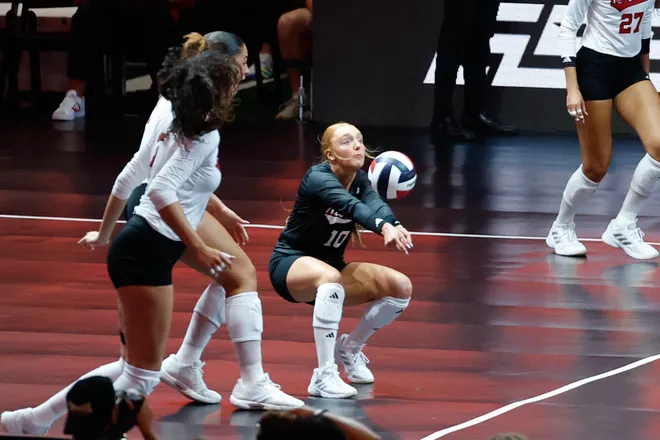Aug 27, 2026; Arlington, TX, USA; Nebraska Cornhuskers defensive specialist Olivia Mauch (10) digs the ball during their volleyball match against the Florida Gators at AT & T Stadium. Mandatory Credit: Chris Jones-Imagn Images