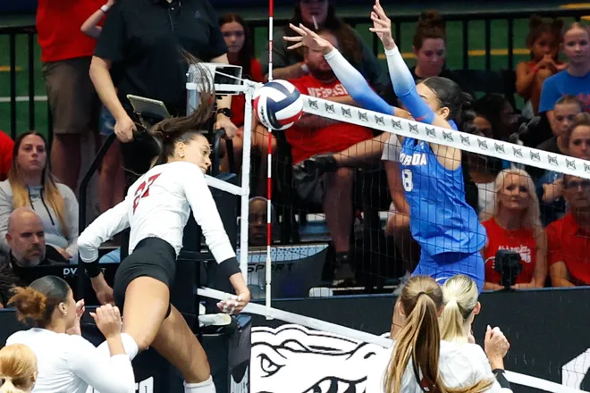 Aug 27, 2026; Arlington, TX, USA; Nebraska Cornhuskers outside hitter Harper Murray (27) attacks the ball against the Florida Gators during their volleyball match at AT & T Stadium. Mandatory Credit: Chris Jones-Imagn Image