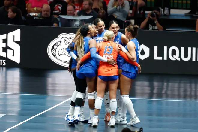 Aug 27, 2026; Arlington, TX, USA; Florida Gators players celebrate a point during their volleyball match against the Nebraska Cornhuskers at AT & T Stadium. Mandatory Credit: Chris Jones-Imagn Images