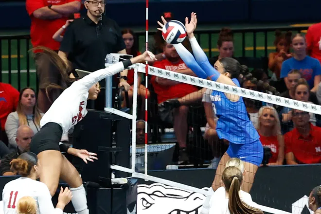 Aug 27, 2026; Arlington, TX, USA; Nebraska Cornhuskers outside hitter Harper Murray (27) attacks the ball against the Florida Gators during their volleyball match at AT & T Stadium. Mandatory Credit: Chris Jones-Imagn Images