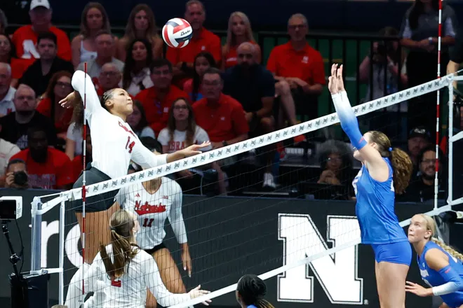 Aug 27, 2026; Arlington, TX, USA; Nebraska Cornhuskers middle blocker Manaia Ogbechie (14) attacks the ball against the Florida Gators during their volleyball match at AT & T Stadium. Mandatory Credit: Chris Jones-Imagn Images