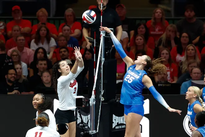 Aug 27, 2026; Arlington, TX, USA; Nebraska Cornhuskers opposite hitter Virginia Adriano (3) attempts to block an attack by Florida Gators middle blocker Alec Rothe (25) during their volleyball match at AT & T Stadium. Mandatory Credit: Chris Jones-Imagn Images
