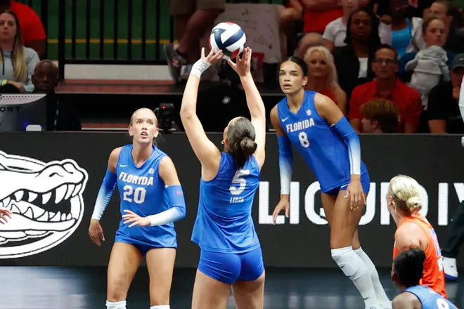 Aug 27, 2026; Arlington, TX, USA; Florida Gators outside hitter Selena Leban (5) sets the ball during their volleyball match against the Nebraska Cornhuskers at AT & T Stadium. Mandatory Credit: Chris Jones-Imagn Images