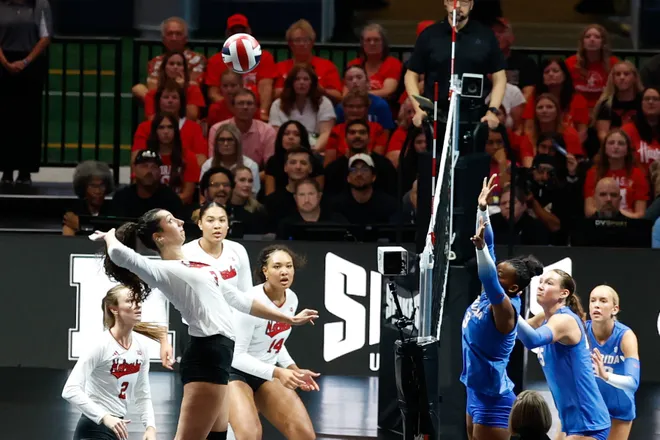 Aug 27, 2026; Arlington, TX, USA; Florida Gators players defend at the net against Nebraska Cornhuskers opposite hitter Virginia Adriano (3) during their volleyball match at AT & T Stadium. Mandatory Credit: Chris Jones-Imagn Images
