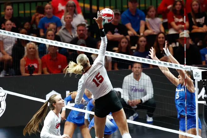 Aug 27, 2026; Arlington, TX, USA; Nebraska Cornhuskers middle blocker Andi Jackson (15) attacks the ball against the Florida Gators during their volleyball match at AT & T Stadium. Mandatory Credit: Chris Jones-Imagn Images