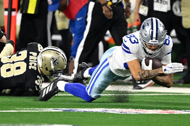 Aug 28, 2026; Arlington, Texas, USA; Dallas Cowboys wide receiver Anthony Smith (83) makes a catch against New Orleans Saints cornerback Jayden Price (38) during the first quarter at AT & T Stadium. Mandatory Credit: Jerome Miron-Imagn Images