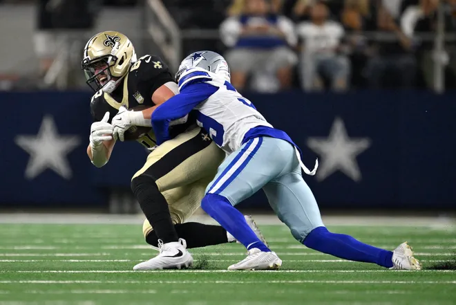 Aug 28, 2026; Arlington, Texas, USA; Dallas Cowboys cornerback Ameer Speed (39) tackles New Orleans Saints tight end Treyton Welch (82) during the second half at AT & T Stadium. Mandatory Credit: Jerome Miron-Imagn Images