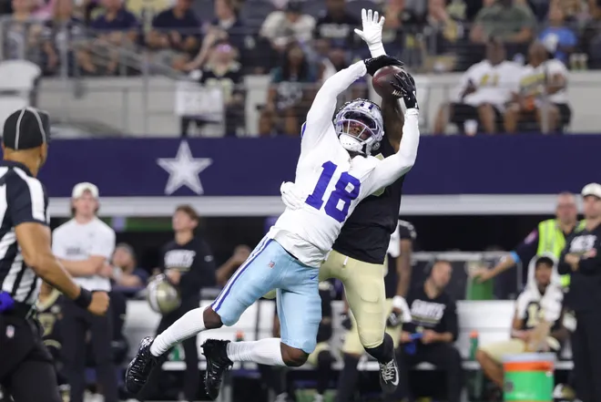 Aug 28, 2026; Arlington, Texas, USA; Dallas Cowboys wide receiver Jordan Hudson (18) makes a catch against New Orleans Saints cornerback David Long Sr. (45) in the second half at AT & T Stadium. Mandatory Credit: Kevin Jairaj-Imagn Images