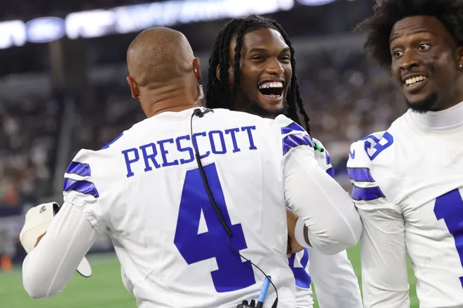 Aug 28, 2026; Arlington, Texas, USA; Dallas Cowboys quarterback Dak Prescott (4) and wide receiver CeeDee Lamb (88) react on the sideline in the second half against the New Orleans Saints at AT & T Stadium. Mandatory Credit: Kevin Jairaj-Imagn Images