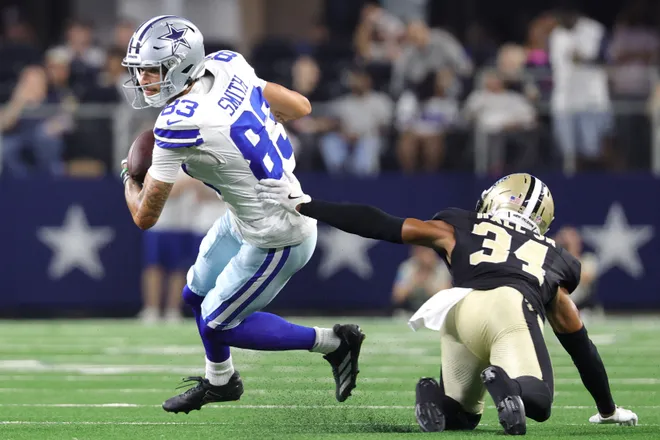 Aug 28, 2026; Arlington, Texas, USA; Dallas Cowboys wide receiver Anthony Smith (83) runs against New Orleans Saints cornerback TJ Hall (34) during the second half at AT & T Stadium. Mandatory Credit: Kevin Jairaj-Imagn Images