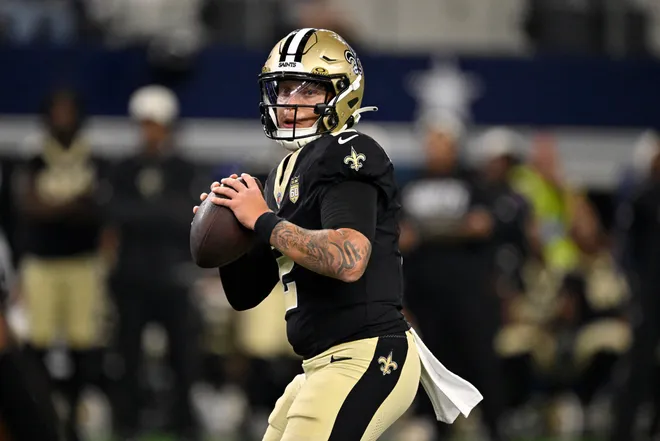 Aug 28, 2026; Arlington, Texas, USA; New Orleans Saints quarterback Spencer Rattler (2) looks to throw against the Dallas Cowboys in the first quarter at AT & T Stadium. Mandatory Credit: Jerome Miron-Imagn Images