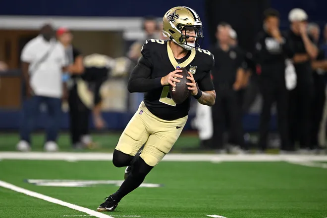 Aug 28, 2026; Arlington, Texas, USA; New Orleans Saints quarterback Spencer Rattler (2) looks to pass against the Dallas Cowboys during the second quarter at AT & T Stadium. Mandatory Credit: Jerome Miron-Imagn Images