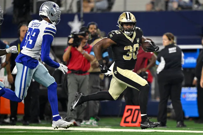 Aug 28, 2026; Arlington, Texas, USA; New Orleans Saints running back Audric Estime (30) runs against the Dallas Cowboys during the second quarter at AT & T Stadium. Mandatory Credit: Jerome Miron-Imagn Images
