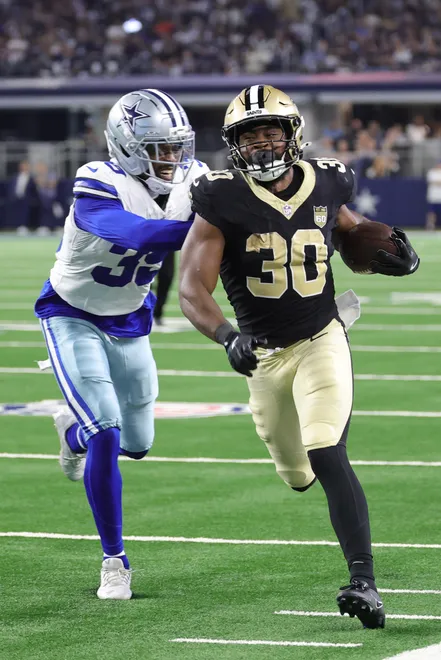 Aug 28, 2026; Arlington, Texas, USA; New Orleans Saints running back Audric Estime (30) runs against Dallas Cowboys cornerback Ameer Speed (39) during the second quarter at AT & T Stadium. Mandatory Credit: Kevin Jairaj-Imagn Images