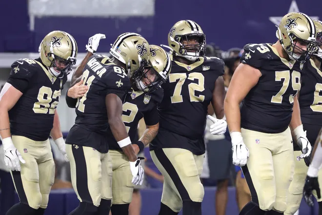 Aug 28, 2026; Arlington, Texas, USA; New Orleans Saints quarterback Spencer Rattler (2) celebrates with teammates after scoring a touchdown against the Dallas Cowboys during the second quarter at AT & T Stadium. Mandatory Credit: Kevin Jairaj-Imagn Images