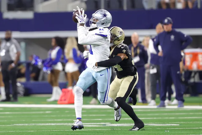 Aug 28, 2026; Arlington, Texas, USA; Dallas Cowboys wide receiver Marquez Valdes-Scantling (11) makes a catch against New Orleans Saints cornerback TJ Hall (34) during the first half at AT & T Stadium. Mandatory Credit: Kevin Jairaj-Imagn Images