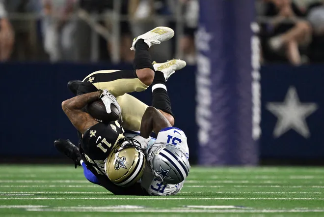 Aug 28, 2026; Arlington, Texas, USA; Dallas Cowboys cornerback Josh Butler (31) tackles New Orleans Saints wide receiver Ronnie Bell (11) during the third quarter at AT & T Stadium. Mandatory Credit: Jerome Miron-Imagn Images