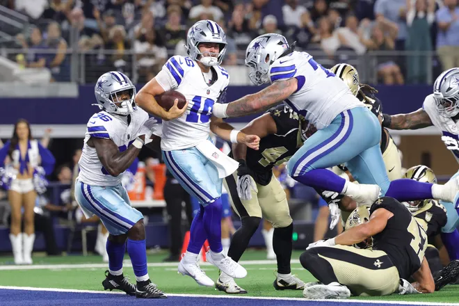 Aug 28, 2026; Arlington, Texas, USA; Dallas Cowboys quarterback Sam Howell (16) scores a two-point conversion against the New Orleans Saints during the fourth quarter at AT & T Stadium. Mandatory Credit: Kevin Jairaj-Imagn Images