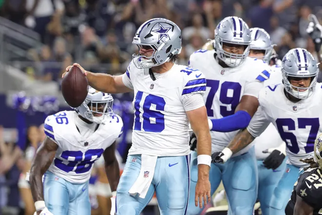 Aug 28, 2026; Arlington, Texas, USA; Dallas Cowboys quarterback Sam Howell (16) celebrates after scoring a two-point conversion against the New Orleans Saints during the fourth quarter at AT & T Stadium. Mandatory Credit: Kevin Jairaj-Imagn Images