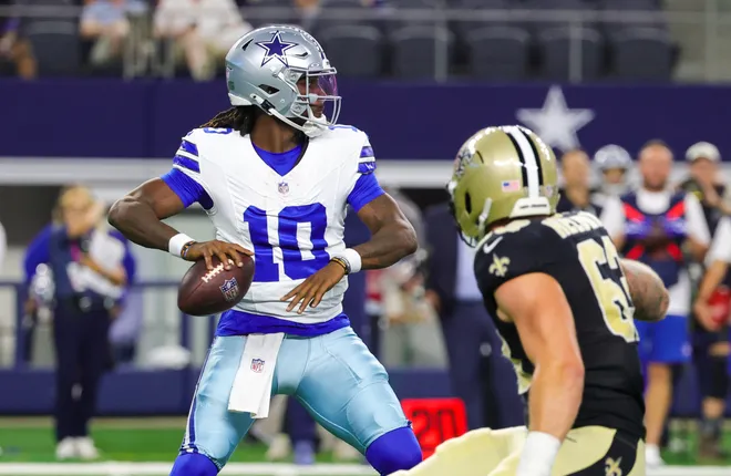 Aug 28, 2026; Arlington, Texas, USA; Dallas Cowboys quarterback Joe Milton III (10) throws past New Orleans Saints defensive end Michael Heldman (63) during the first half at AT & T Stadium. Mandatory Credit: Kevin Jairaj-Imagn Images