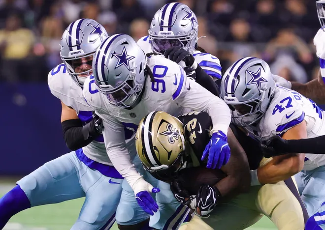 Aug 28, 2026; Arlington, Texas, USA; Dallas Cowboys linebacker Tyrus Wheat (90) tackles New Orleans Saints running back CJ Donaldson (43) during the game at AT & T Stadium. Mandatory Credit: Kevin Jairaj-Imagn Images