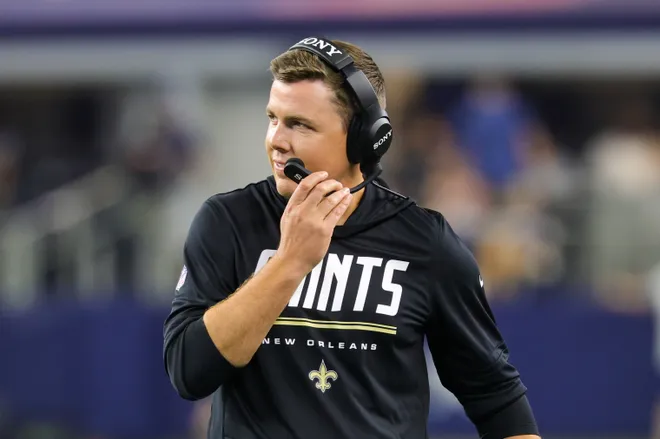 Aug 28, 2026; Arlington, Texas, USA; New Orleans Saints head coach Kellen Moore reacts during the first half against the Dallas Cowboys at AT & T Stadium. Mandatory Credit: Kevin Jairaj-Imagn Images