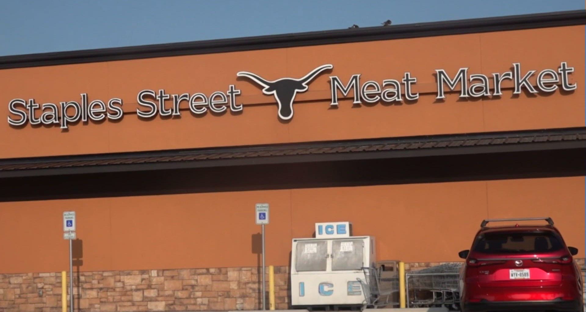 University of Texas SUES Corpus Christi Meat Market Over Longhorn Logo