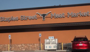University of Texas SUES Corpus Christi Meat Market Over Longhorn Logo