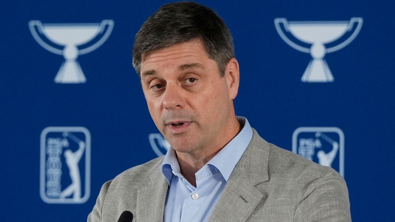 PGA Tour CEO Brian Rolapp speaks before a practice round of the Tour Championship golf tournament, Wednesday, Aug. 20, 2025, in Atlanta. (AP Photo/Mike Stewart)