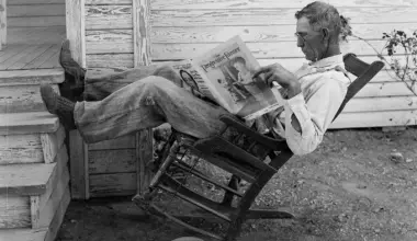 A Farmer Reading His Paper. Photographed by George W. Ackerman, Coryell County, Texas, September 1931.