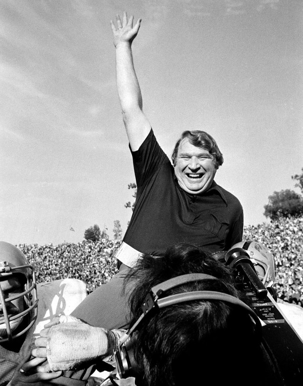 Coach John Madden of the Oakland Raiders is carried from the field by his players after his team defeated the Minnesota Vikings in Super Bowl XIl in Pasadena, Calif., Jan. 9, 1977. The Oakland Raiders will face the Tampa Bay Buccaneers in in Super Bowl XXXVII in San Diego Sunday, Jan. 26, 2003. (AP Photo/files)