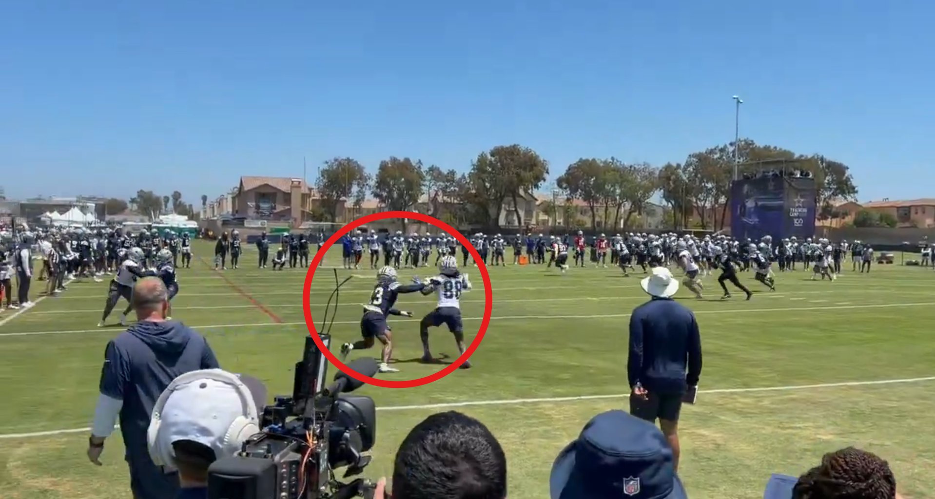 Dallas Cowboys safety/nickel Caleb Downs defends CeeDee Lamb in the end zone during training camp practice in Oxnard, California.