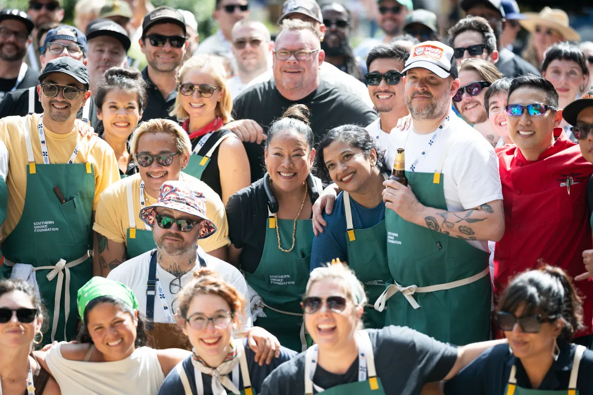 Southern Smoke founder Chris Shepherd (top center) among a group of participating chefs at the 2025 Southern Smoke Festival