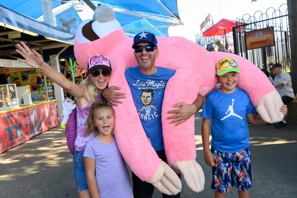 State Fair family wins prize stuffed animal.