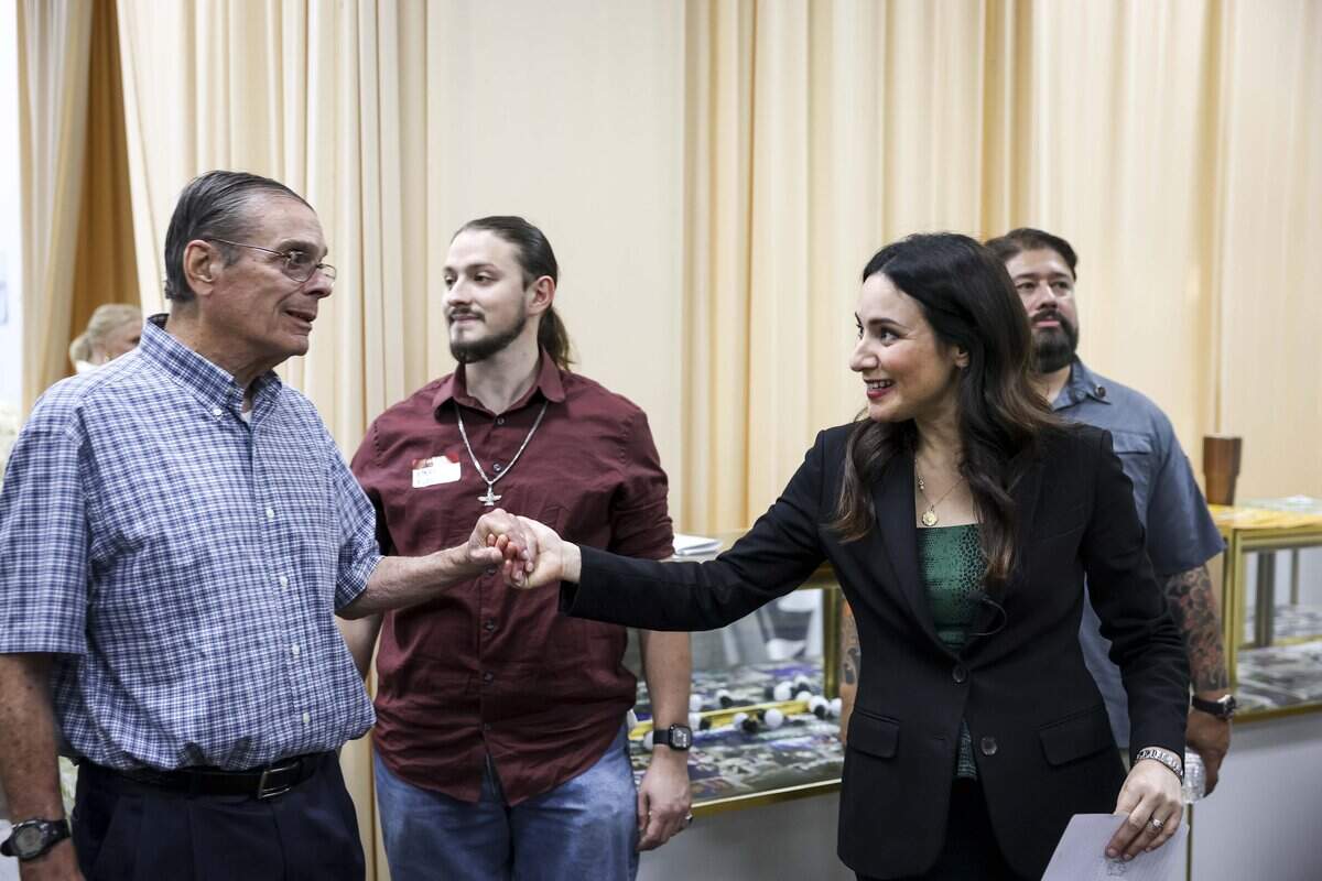Rep. Gina Hinojosa, Democratic candidate for governor of Texas, shakes a supporter's hand during her rally at Eventos Licon on Tuesday, Aug. 25, 2026 in Fort Worth.