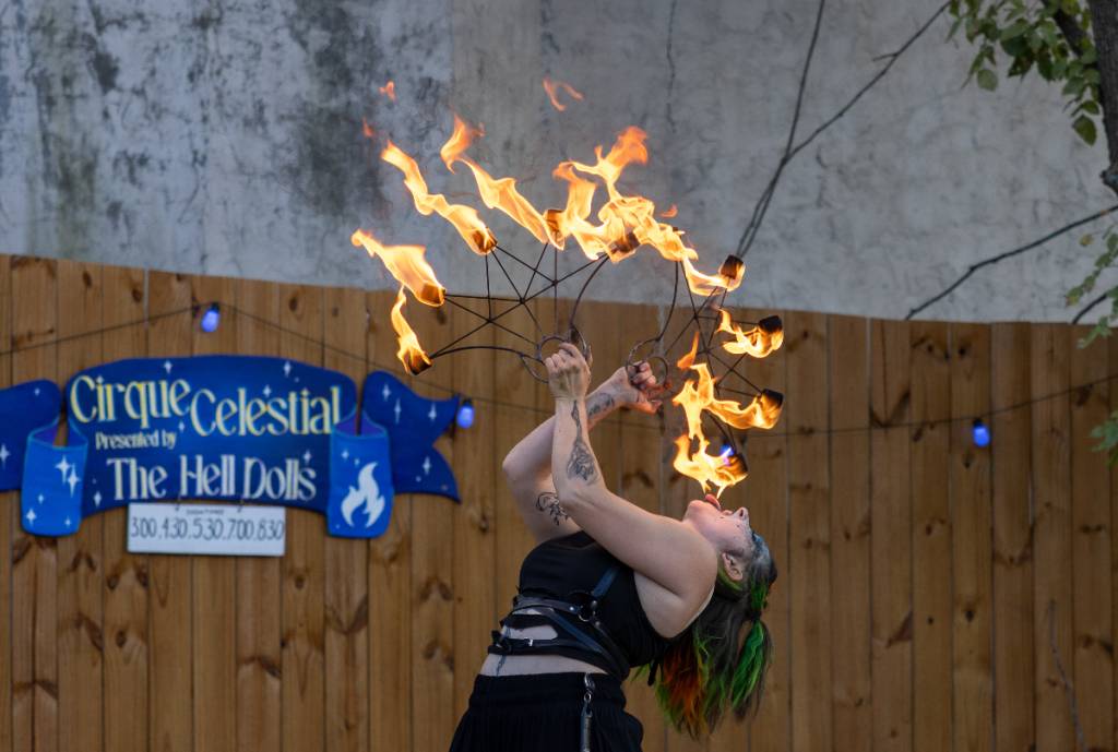 Image shows a fire performer at Scarborough's Hollow. 