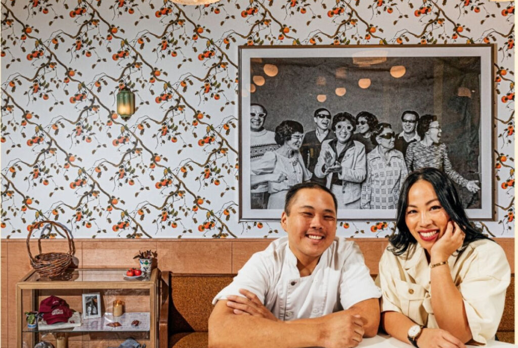 Image shows owners of Agnes & Sherman posing for a photograph.